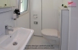 Waschbecken und WC in KRAUSS Ferienbungalow